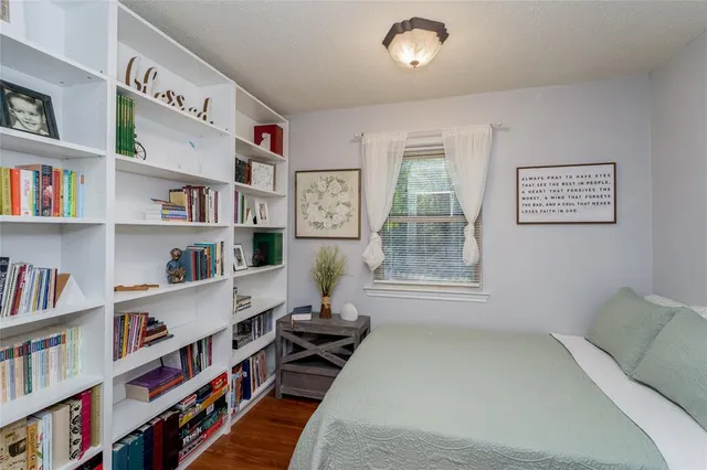 a view of a porch with wooden floor