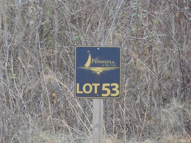 a sign that is on a brick wall