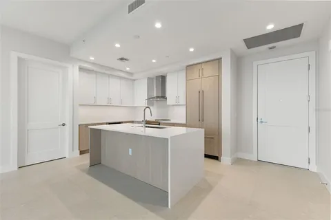 a view of a kitchen with a sink