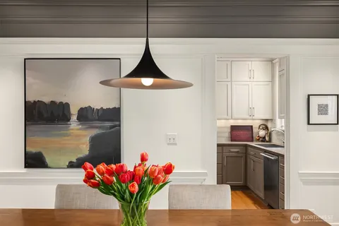 a view of a kitchen with a sink and cabinets