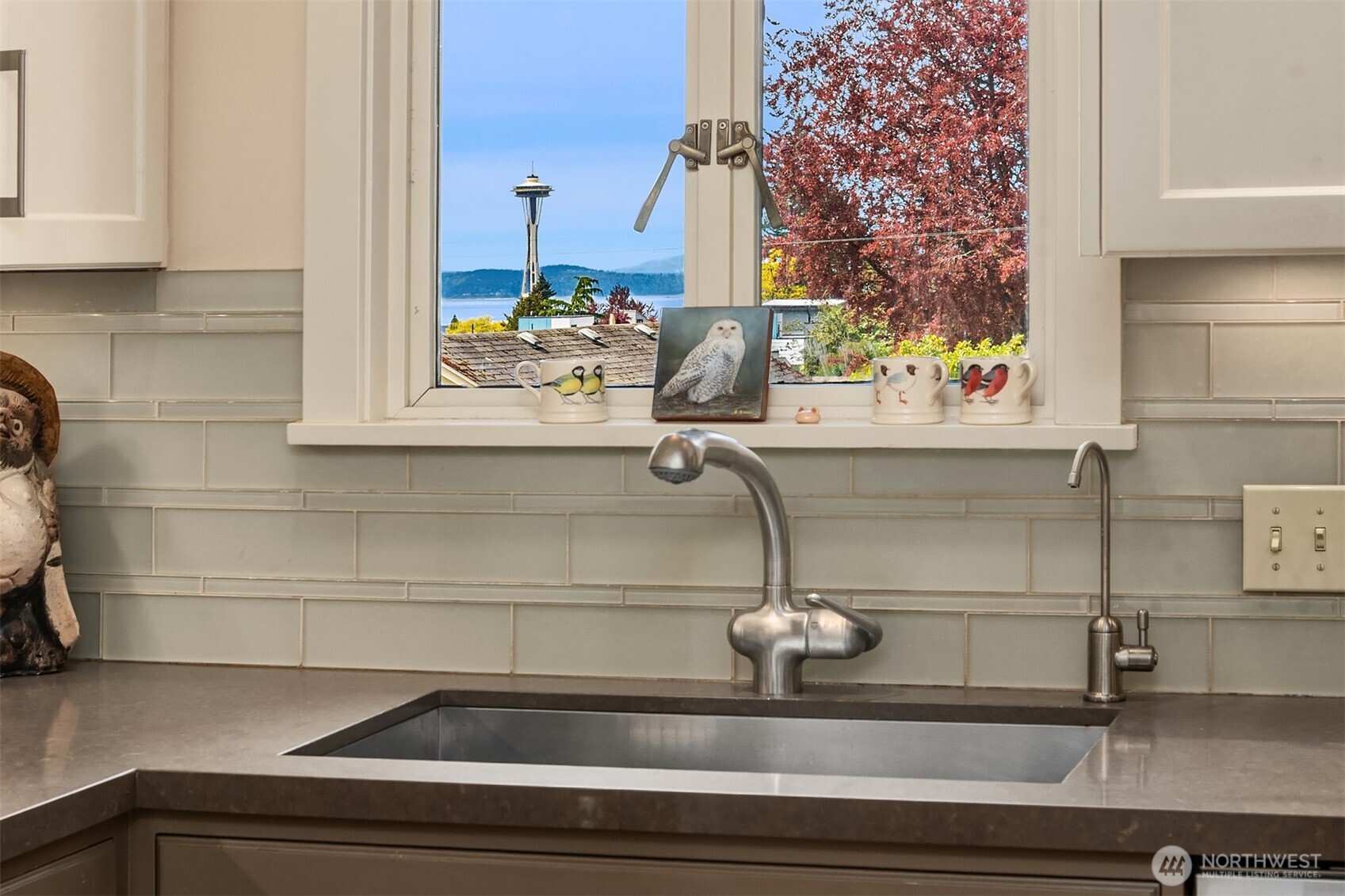 941 11th Avenue East, Unit 3 Seattle, WA 98102 - Photo 14 of 24 a bathroom with a sink and mirror