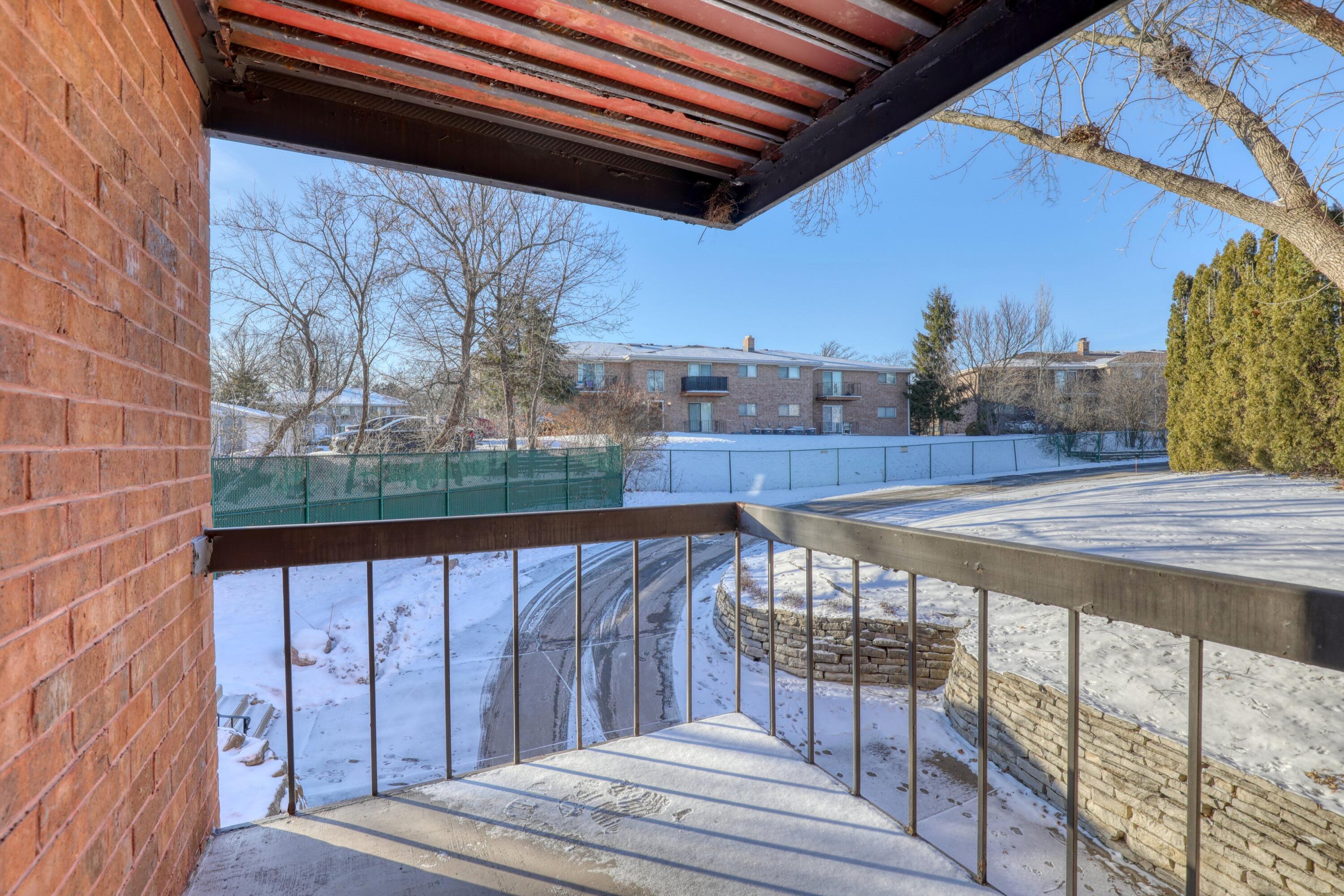 4215 North 100th Street, Unit 151C Milwaukee, WI 53222 - Photo 21 of 39 Master Balcony