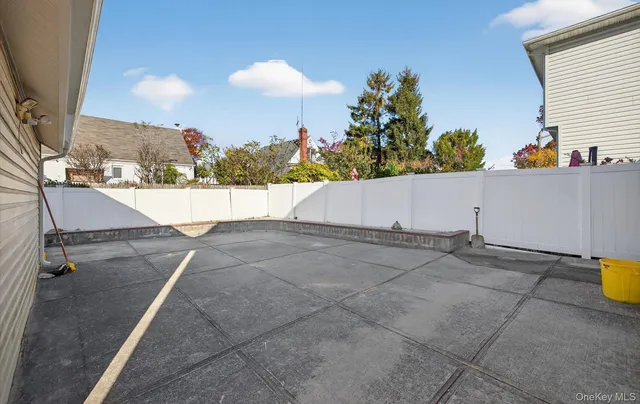 a view of a back yard of the house