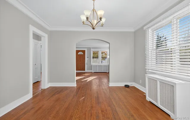a view of livingroom with wooden floor