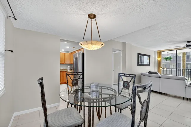 a view of a park with trees and plants