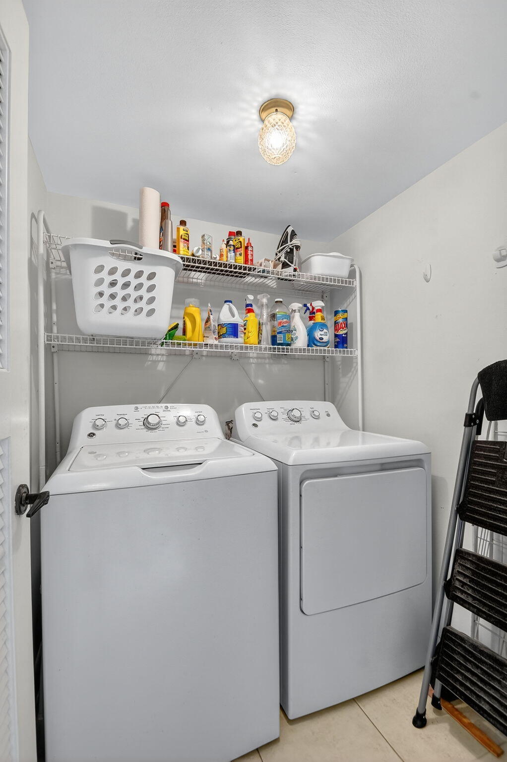 2424 North Federal Highway, Unit 207 Boynton Beach, FL 33435 - Photo 25 of 49 a utility room with dryer and washer