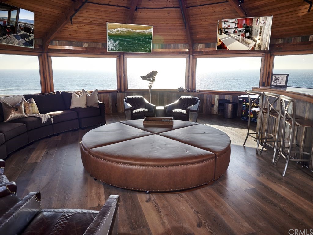 1 Anderson Street Seal Beach, CA 92649 - Photo 21 of 23 a living room with furniture and large windows