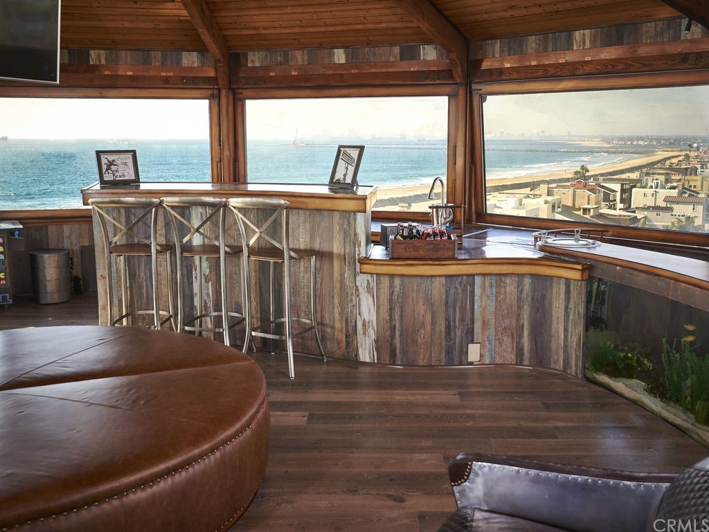 1 Anderson Street Seal Beach, CA 92649 - Photo 22 of 23 a view of a balcony with chairs