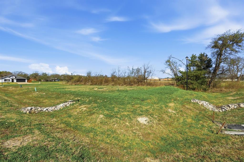 525 Tiber River Road Italy, TX 76651 - Photo 7 of 14 a view of a field with an ocean