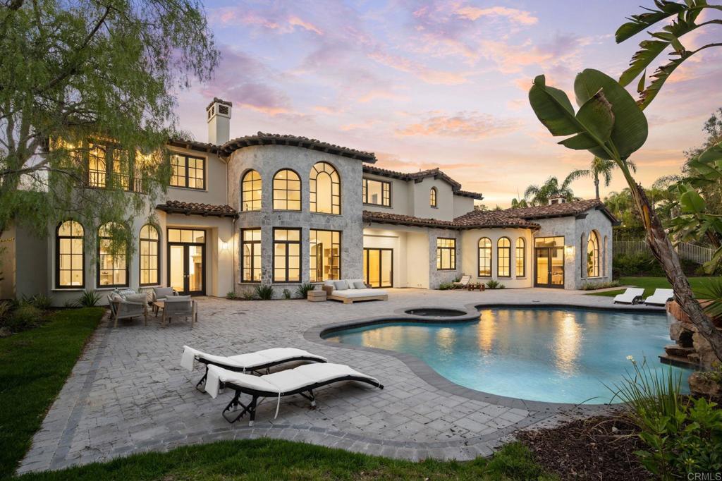 5146 Rancho Verde Trail San Diego, CA 92130 - Photo 2 of 34 a front view of a house with yard