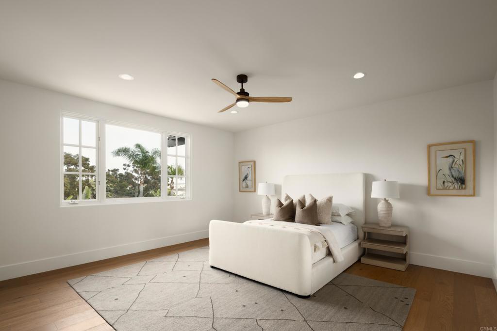 5146 Rancho Verde Trail San Diego, CA 92130 - Photo 22 of 34 a living room with furniture and a ceiling fan