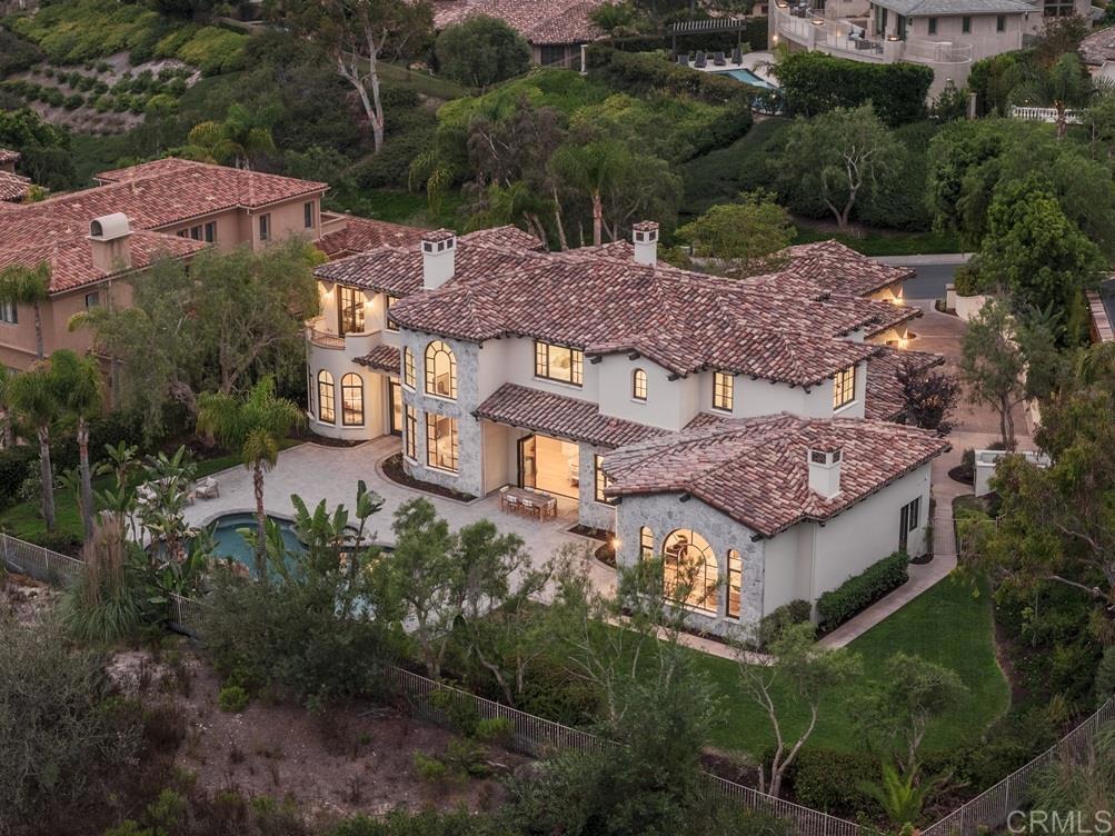 5146 Rancho Verde Trail San Diego, CA 92130 - Photo 30 of 34 an aerial view of houses with a yard