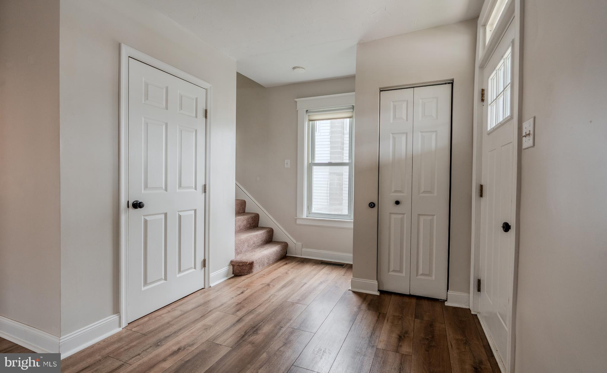 48 West High Street Windsor, PA 17366 - Photo 12 of 23 a view of a hallway with wooden floor and closet area