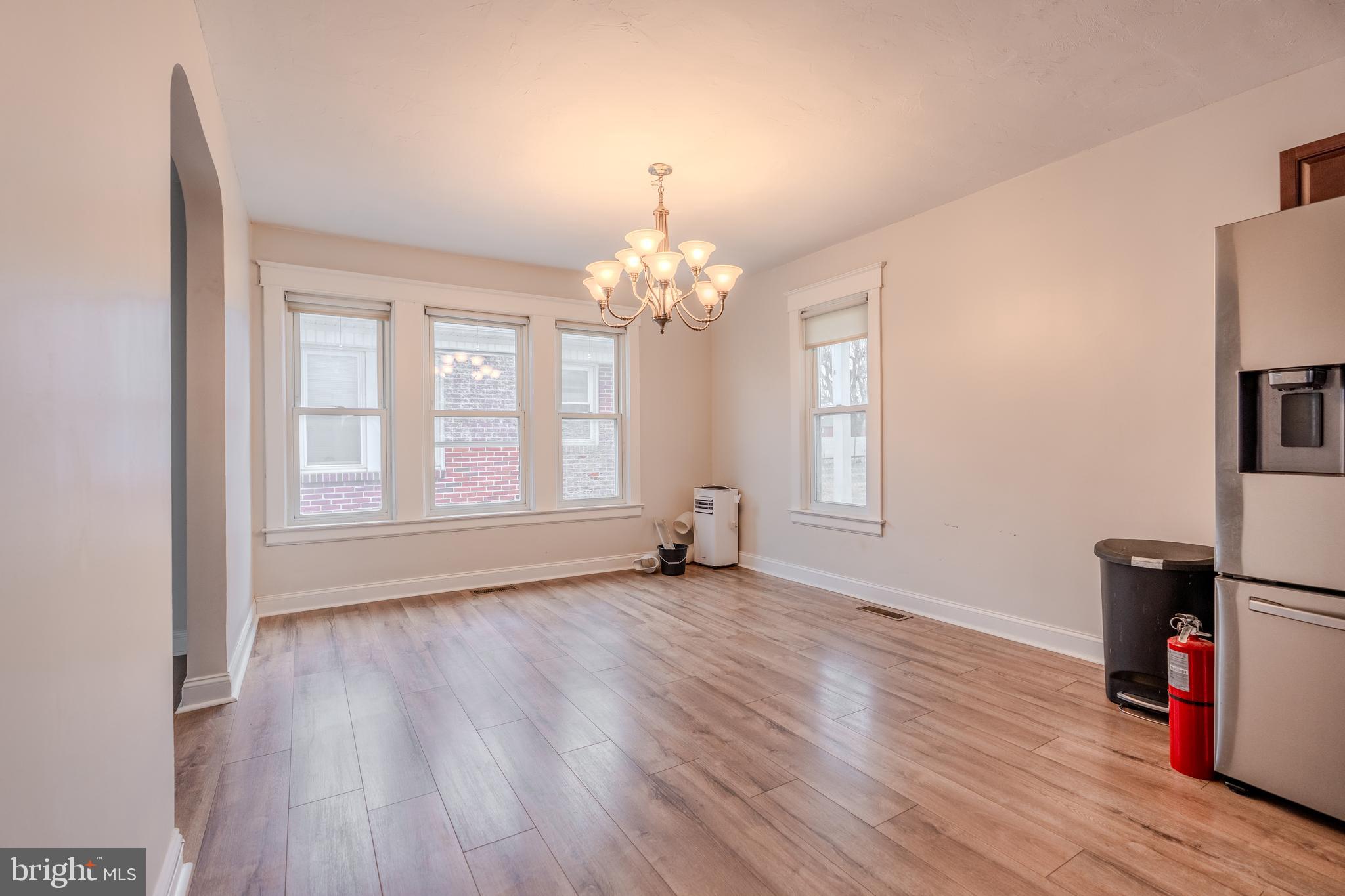 48 West High Street Windsor, PA 17366 - Photo 13 of 23 a view of an empty room with wooden floor and a window