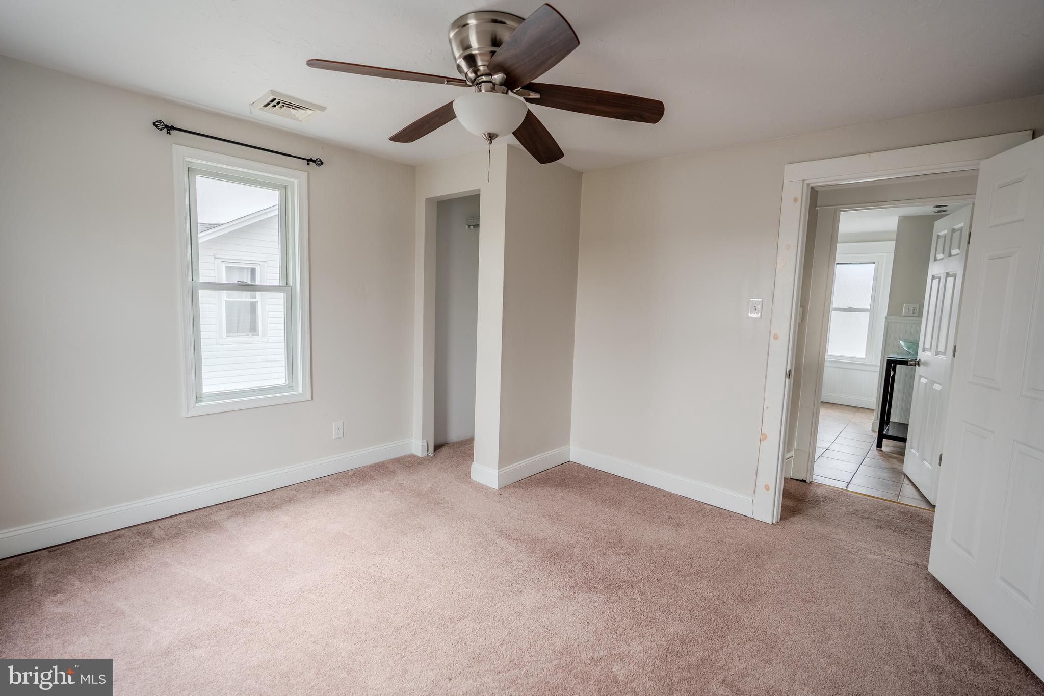 48 West High Street Windsor, PA 17366 - Photo 17 of 23 a view of an empty room with a window
