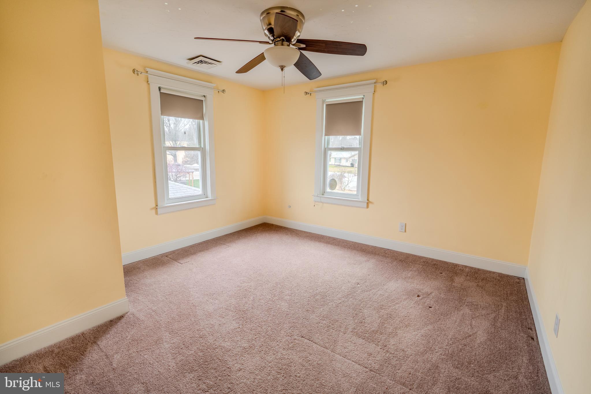 48 West High Street Windsor, PA 17366 - Photo 18 of 23 an empty room with windows and fan