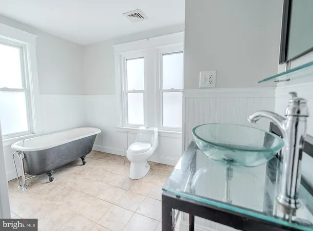 a bathroom with a sink and a toilet