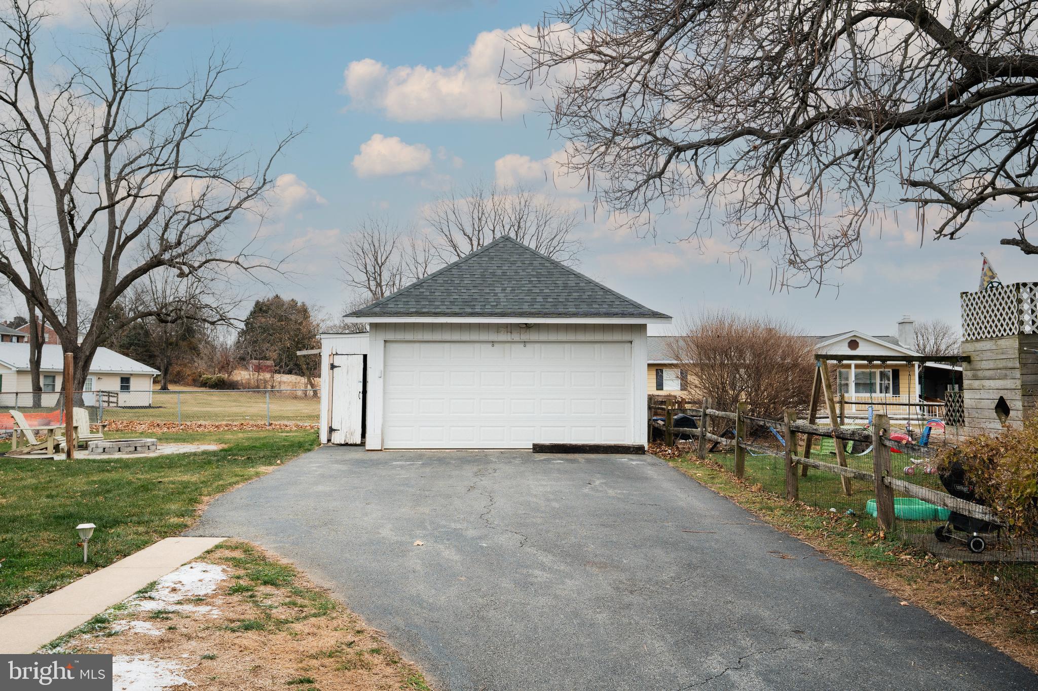 48 West High Street Windsor, PA 17366 - Photo 6 of 23 a front view of a house with a yard and pathway