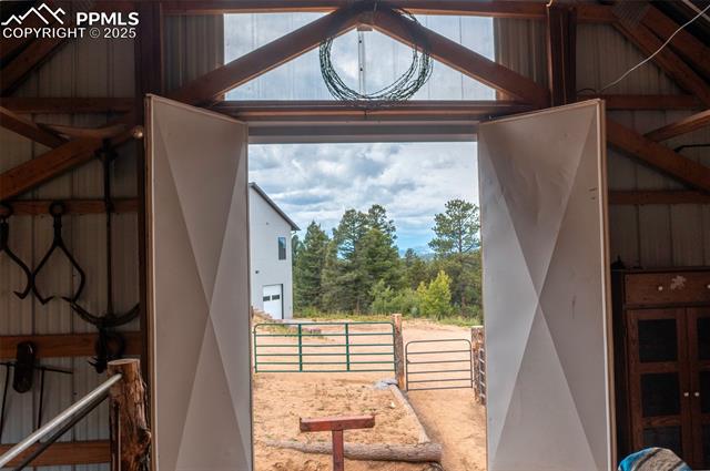 983 Rangeview Road Divide, CO 80814 - Photo 5 of 50 Inside the barn looking out
