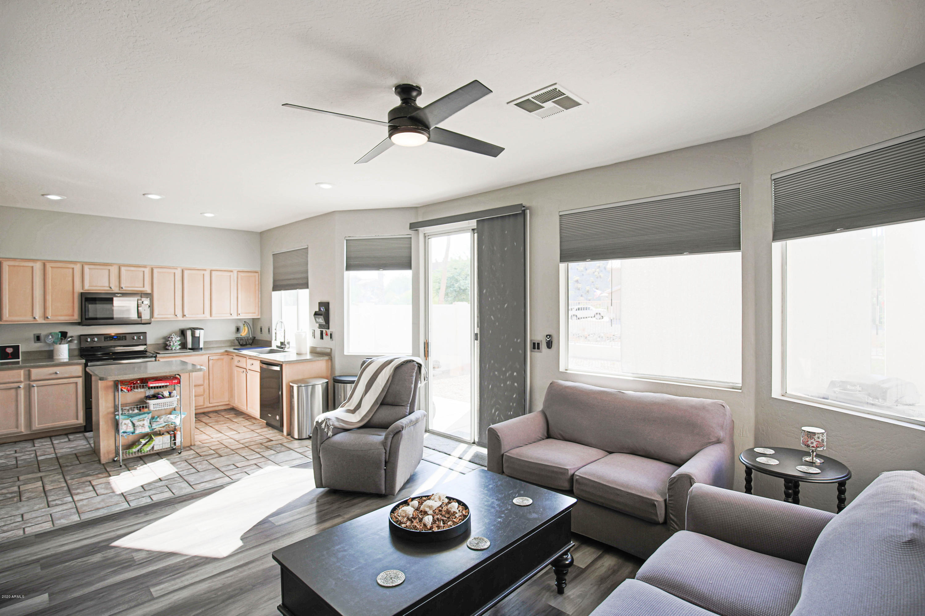 16666 South 21st Street Phoenix, AZ 85048 - Photo 13 of 43 a living room with furniture and a large window