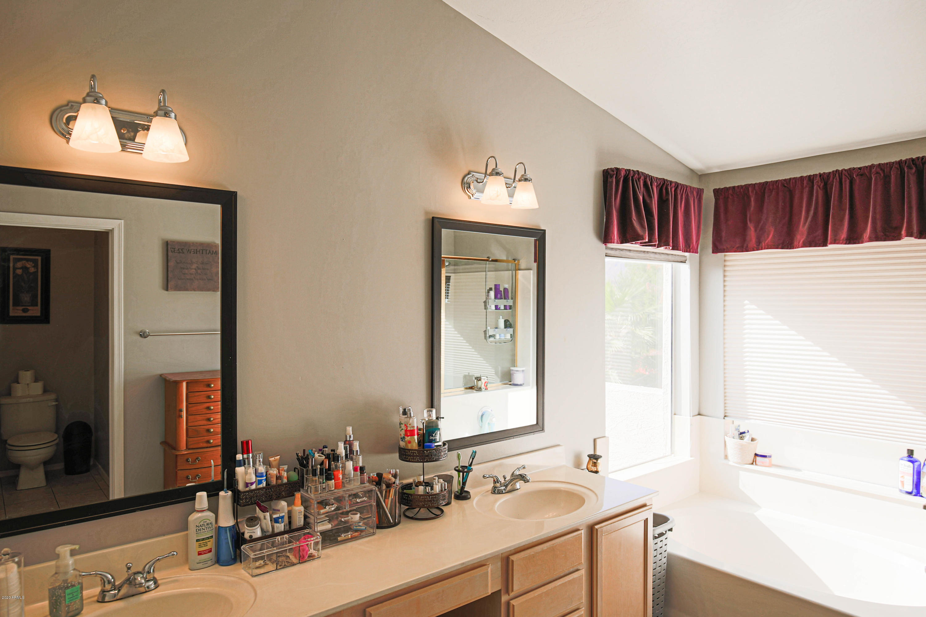 16666 South 21st Street Phoenix, AZ 85048 - Photo 24 of 43 a bathroom with a sink and a mirror