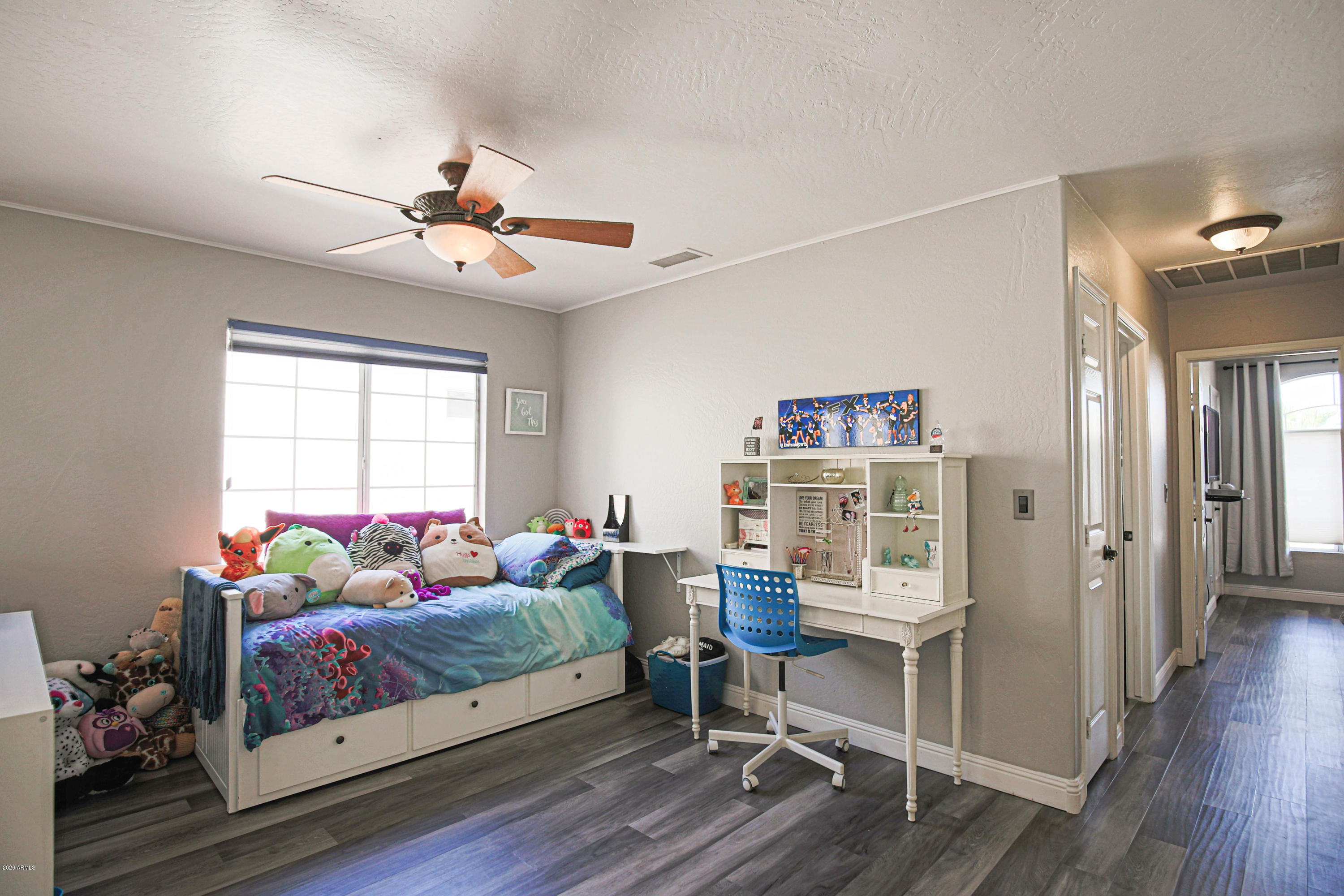 16666 South 21st Street Phoenix, AZ 85048 - Photo 29 of 43 a bedroom with furniture and a window