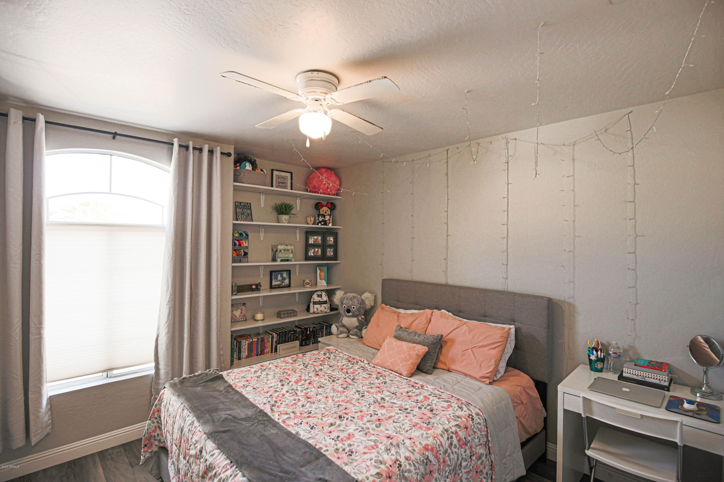 16666 South 21st Street Phoenix, AZ 85048 - Photo 31 of 43 a bedroom with a bed and a window