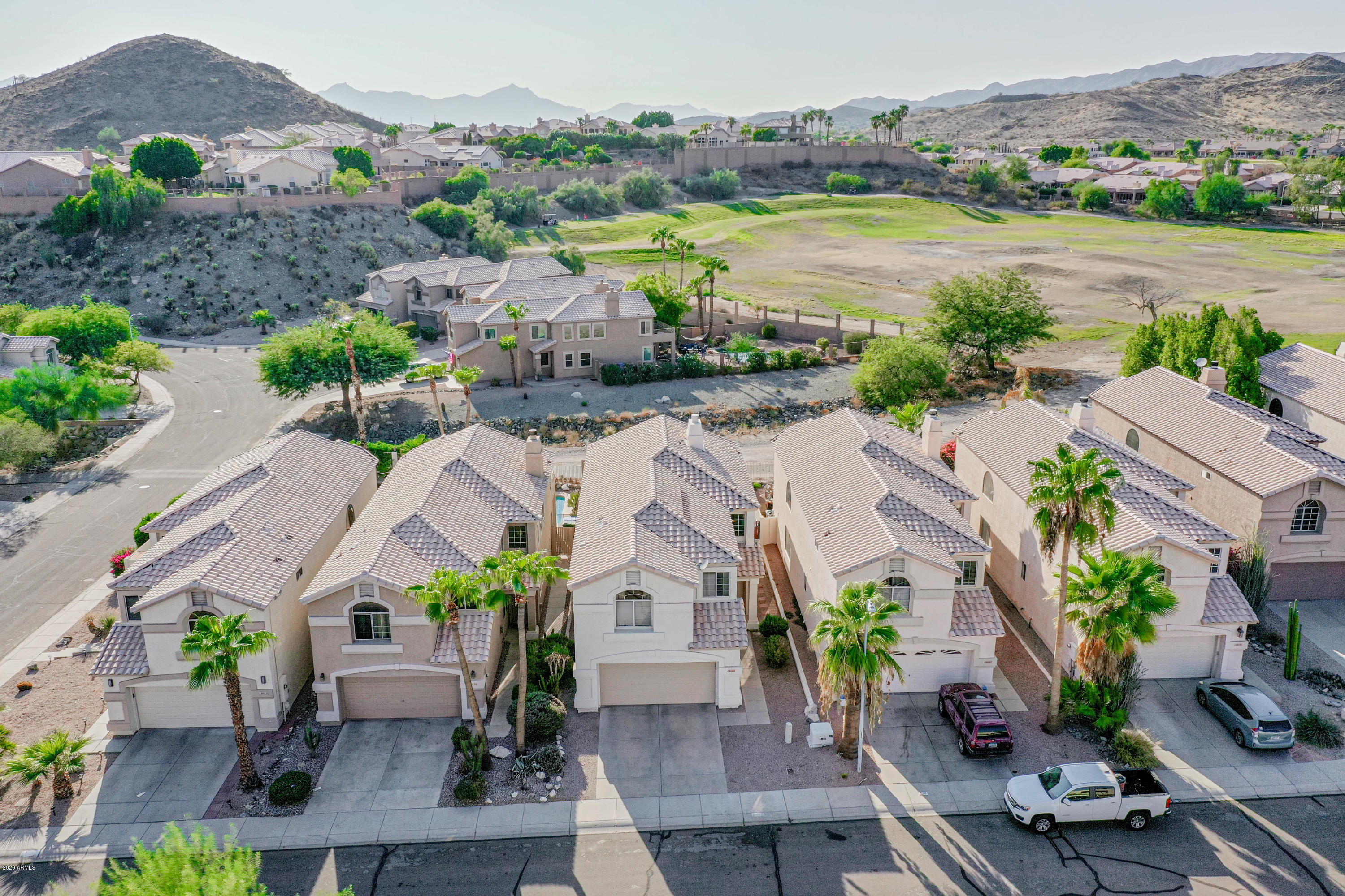 16666 South 21st Street Phoenix, AZ 85048 - Photo 39 of 43 an aerial view of residential houses with outdoor space and ocean view