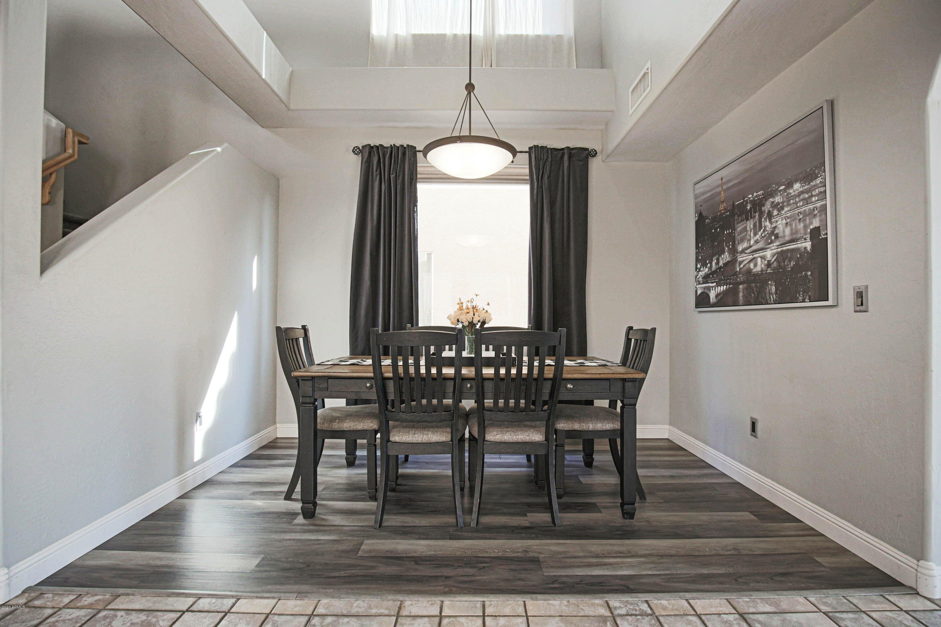 16666 South 21st Street Phoenix, AZ 85048 - Photo 4 of 43 a view of a dining room with furniture window and wooden floor