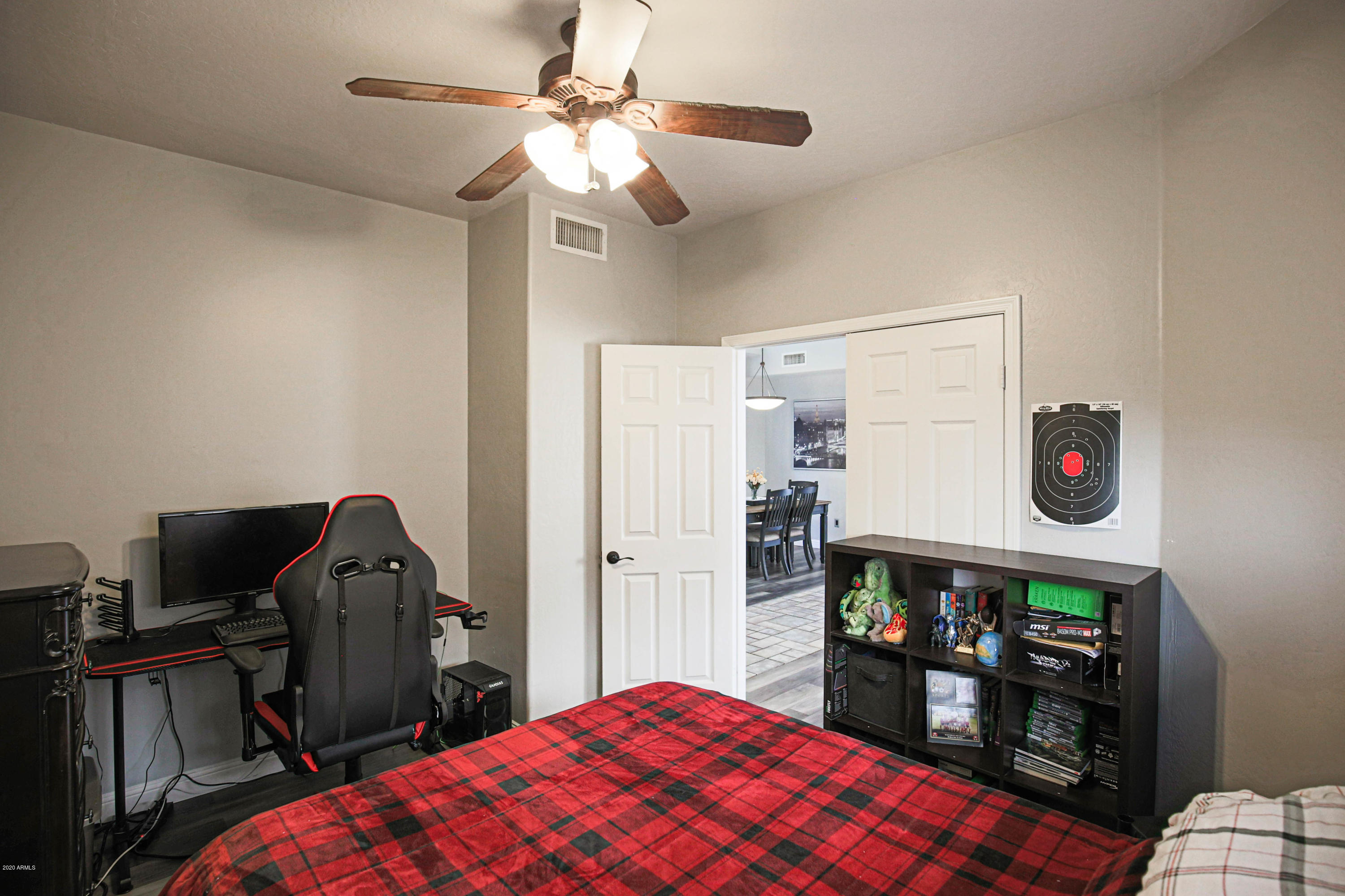 16666 South 21st Street Phoenix, AZ 85048 - Photo 7 of 43 a bedroom with a bed and a desk