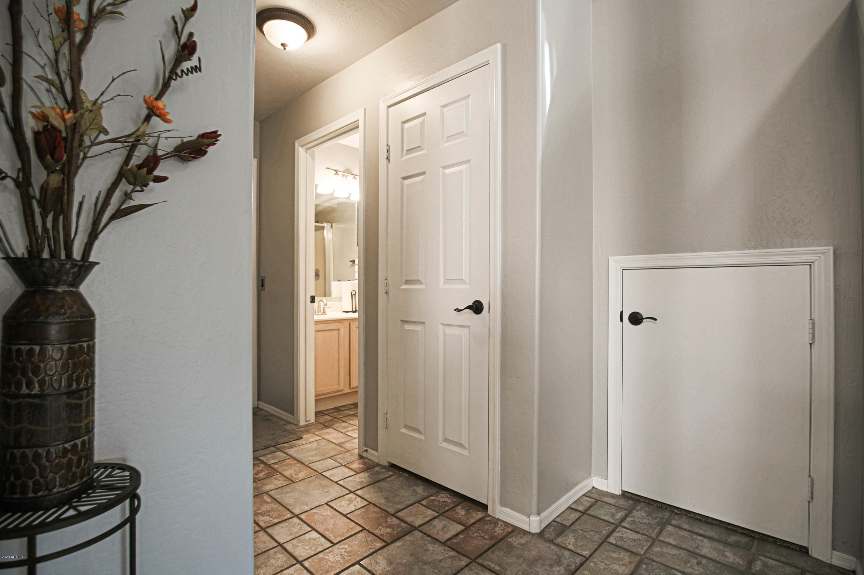 16666 South 21st Street Phoenix, AZ 85048 - Photo 9 of 43 a view of a bathroom with a shower and a sink