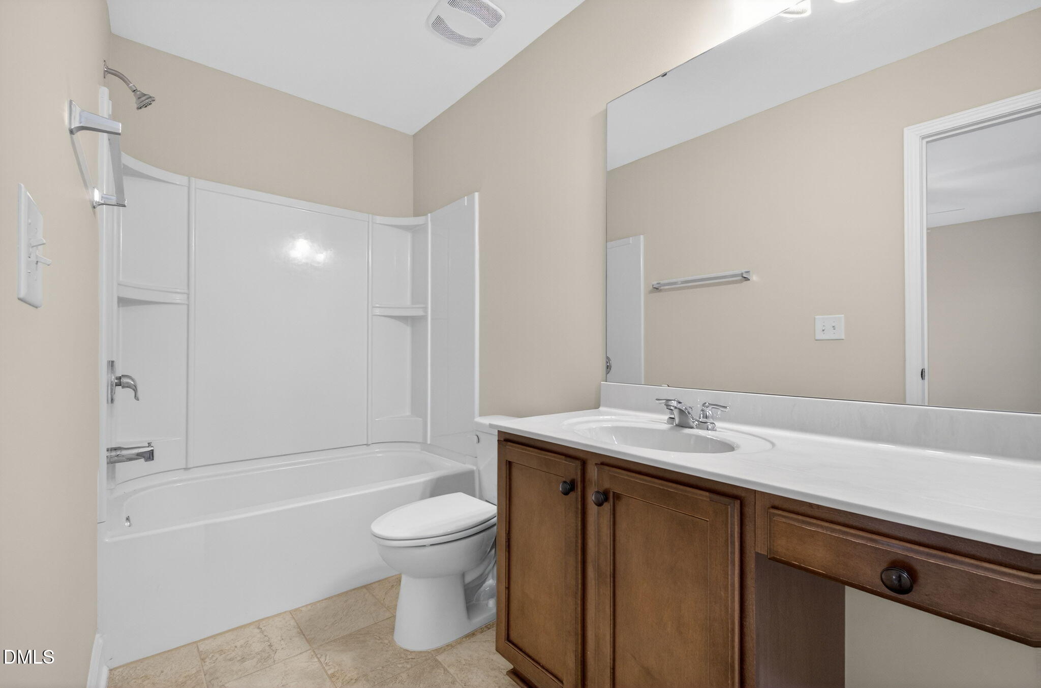 1304 Barnford Mill Road Wake Forest, NC 27587 - Photo 32 of 44 a bathroom with a sink a toilet and shower