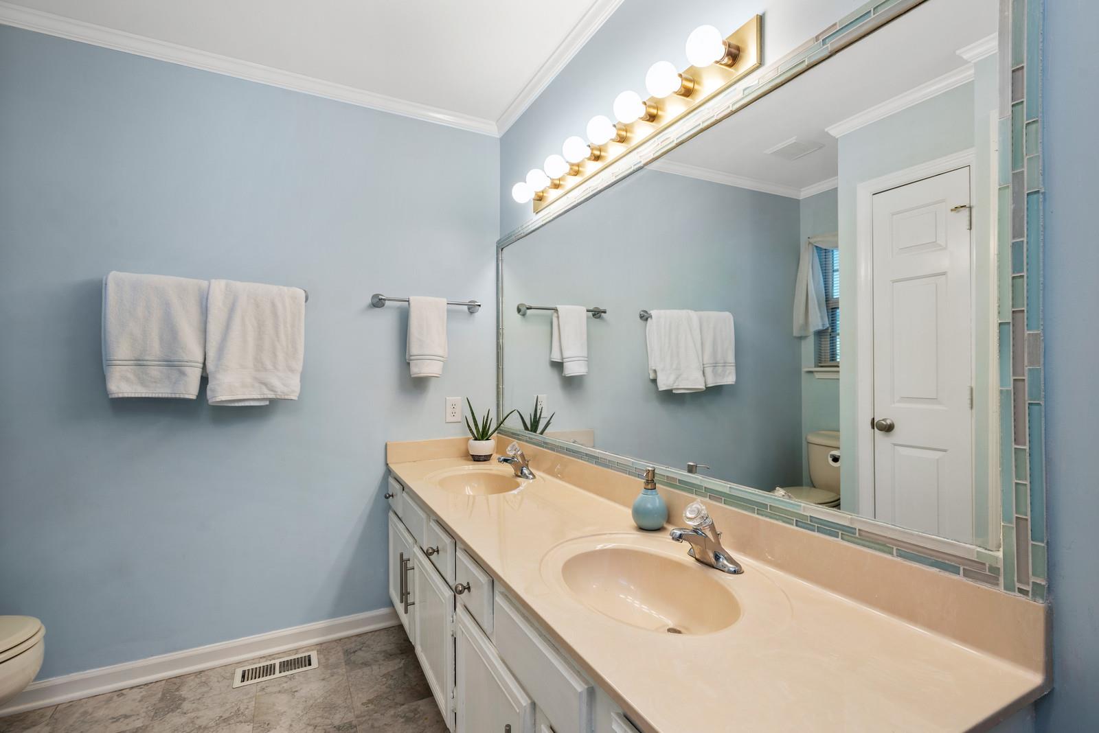 682 Baker Road Columbia, TN 38401 - Photo 18 of 30 a bathroom with a sink and a mirror