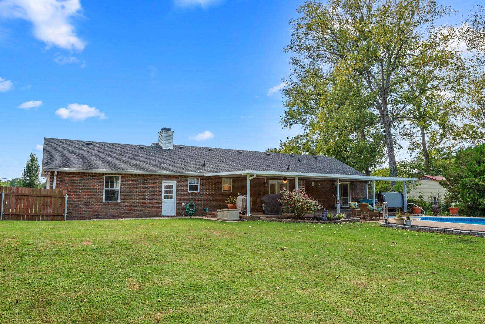 682 Baker Road Columbia, TN 38401 - Photo 27 of 30 a view of a house with a backyard