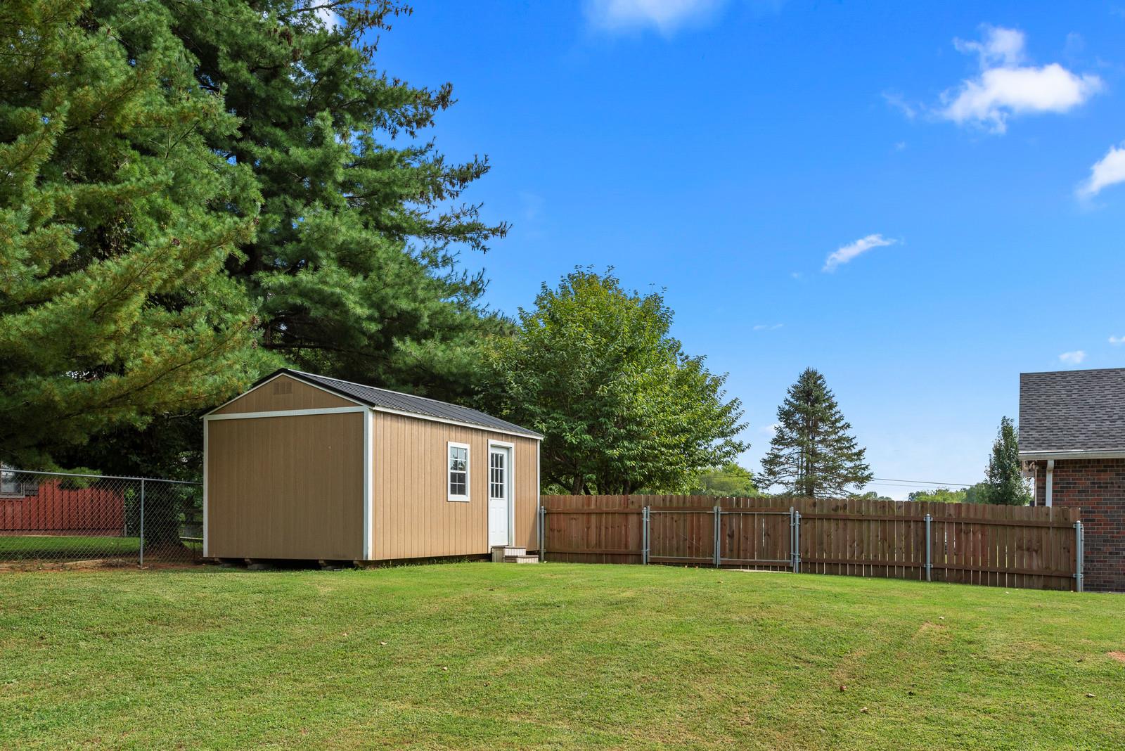 682 Baker Road Columbia, TN 38401 - Photo 28 of 30 a view of a small house with a yard