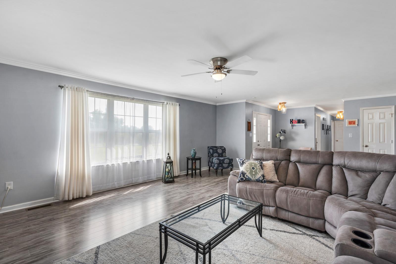 682 Baker Road Columbia, TN 38401 - Photo 7 of 30 a living room with furniture and a ceiling fan