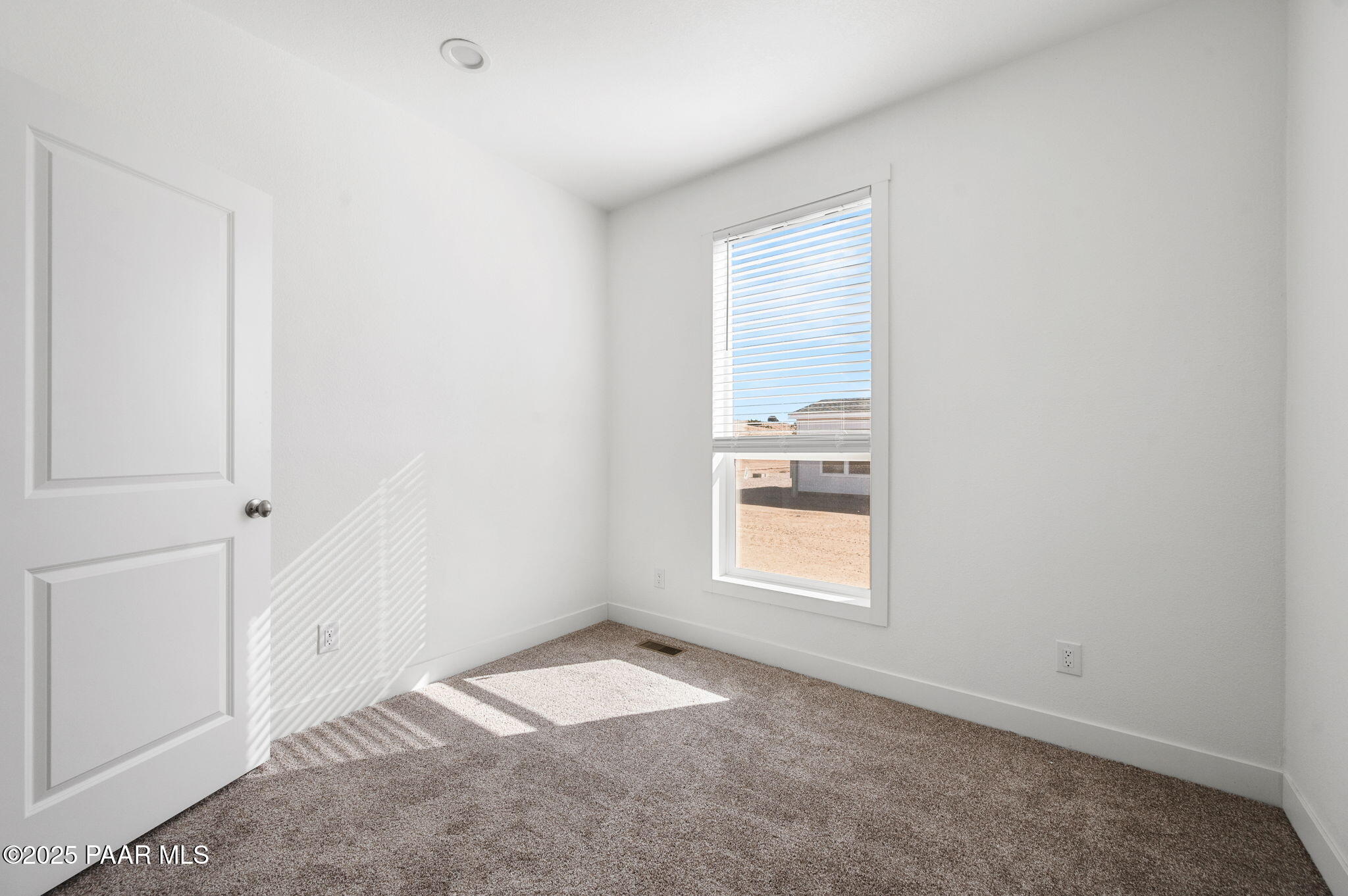 39 East Abra Road Paulden, AZ 86334 - Photo 17 of 23 a view of a room that has a window in it