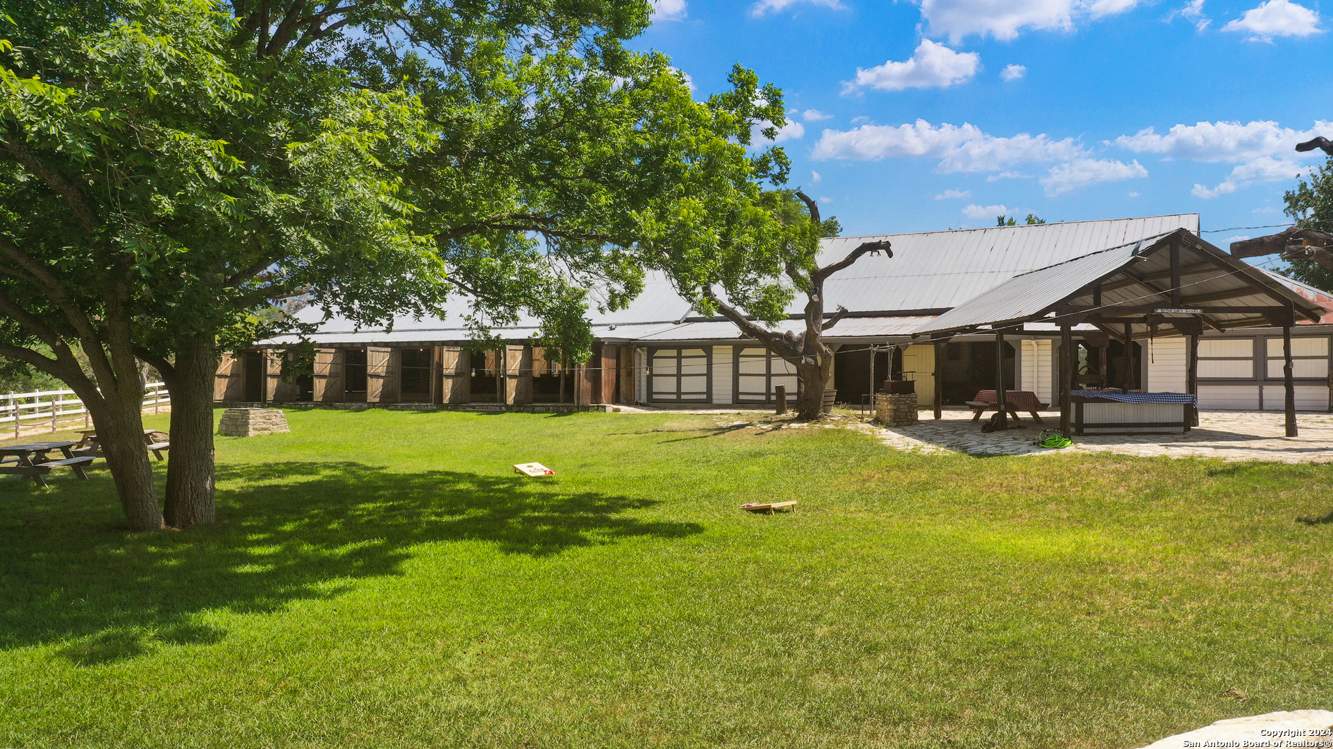 109 Waring Welfare Road Boerne, TX 78006 - Photo 20 of 21 a front view of house with yard and seating area