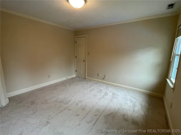 wooden floor and windows in an empty room