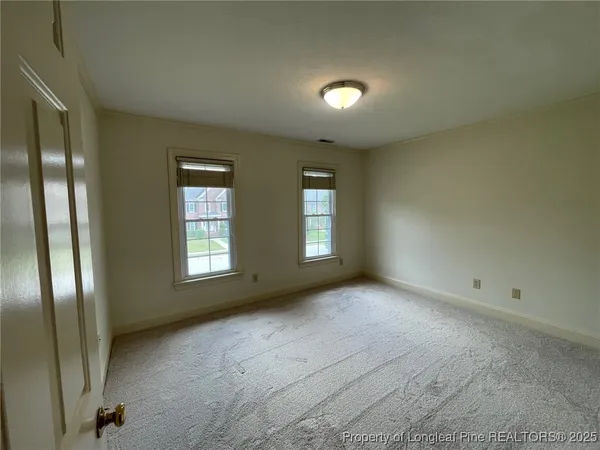 an empty room with a natural light