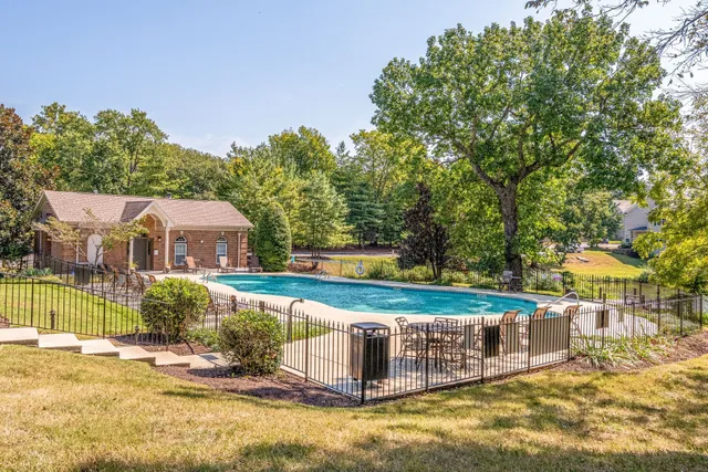 a view of a houses with a yard
