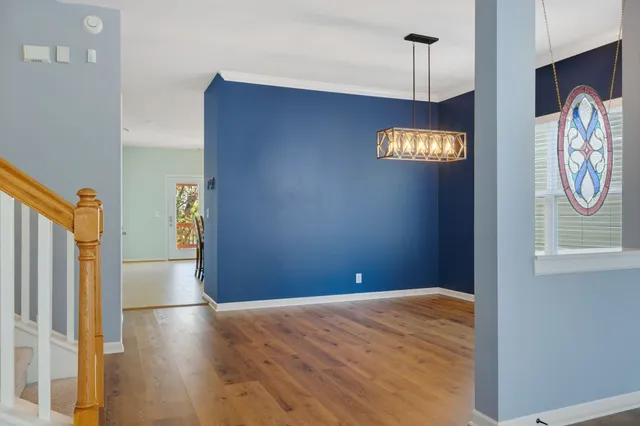 a view of an empty room and window