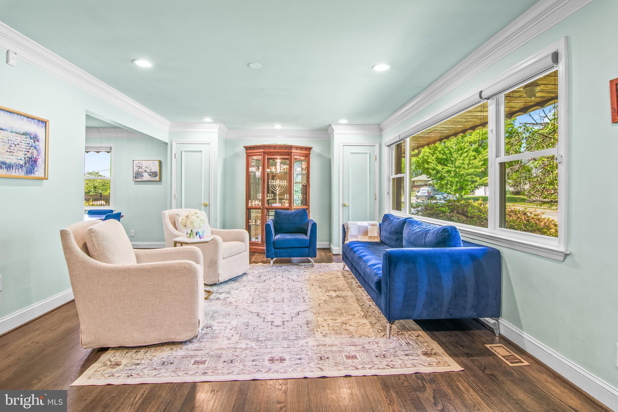 6308 Ivymount Road Baltimore, MD 21209 - Photo 2 of 22 a living room with furniture and a large window