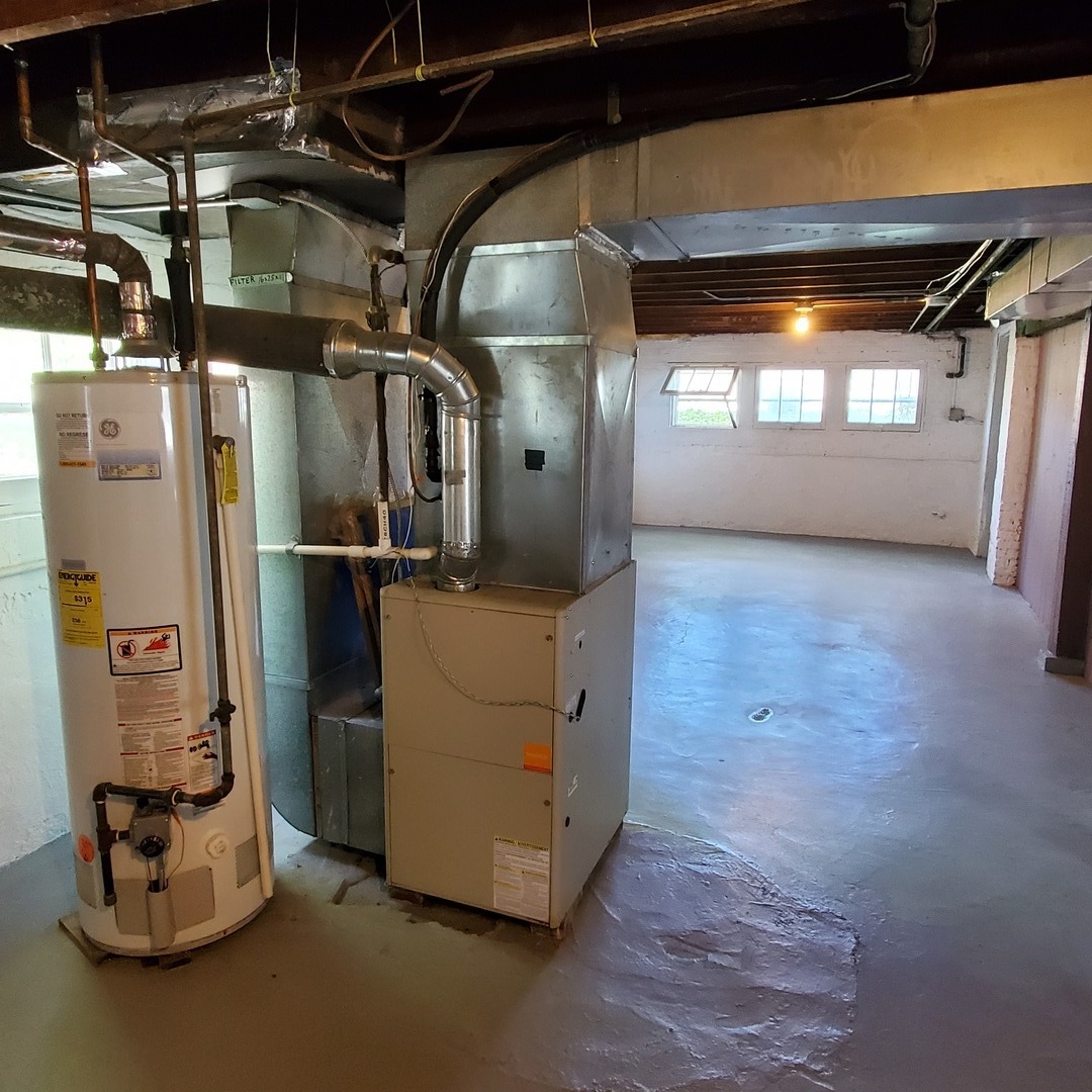 123 Northgate Road Riverside, IL 60546 - Photo 22 of 29 a room with water heater and windows