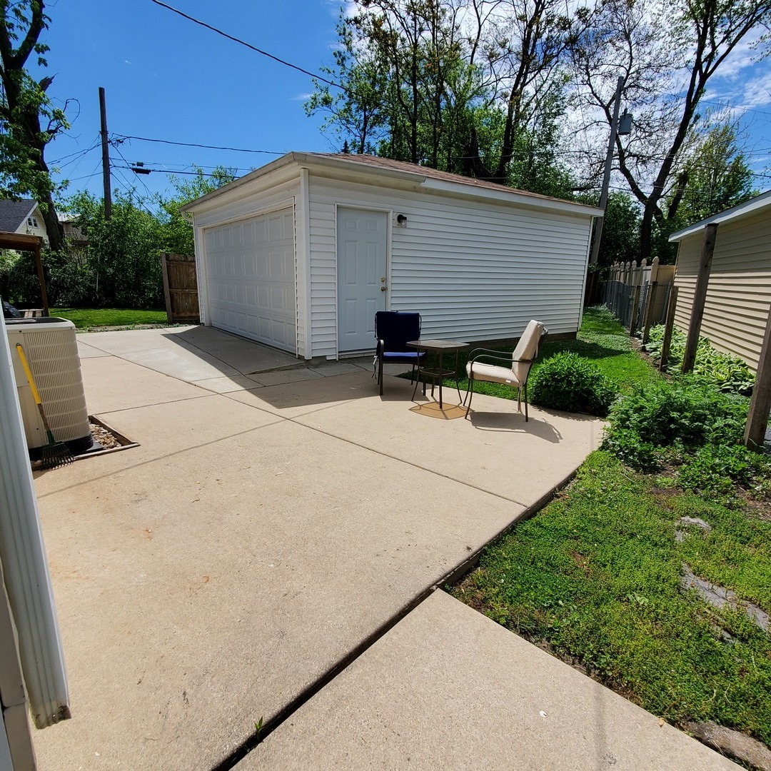 123 Northgate Road Riverside, IL 60546 - Photo 24 of 29 a view of backyard with sitting area