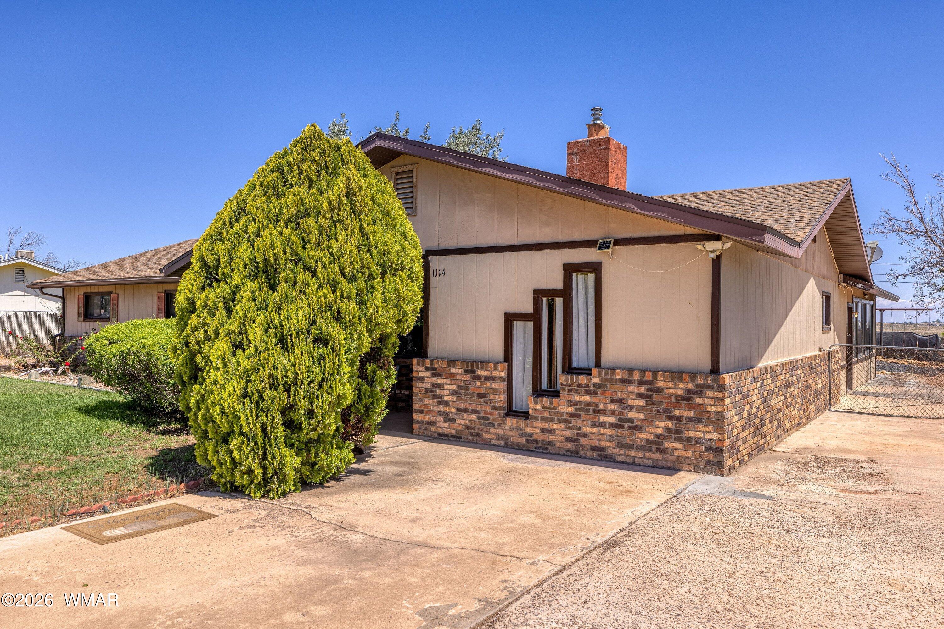 1114 Ranch Road Taylor, AZ 85939 - Photo 6 of 32 a view of a house with a small yard