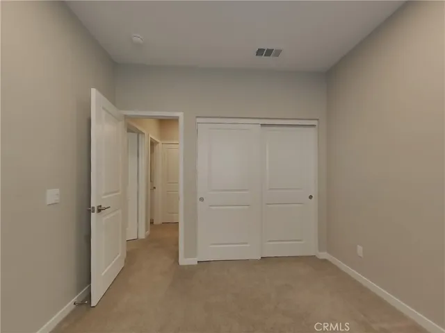 wooden floor and closet in a room