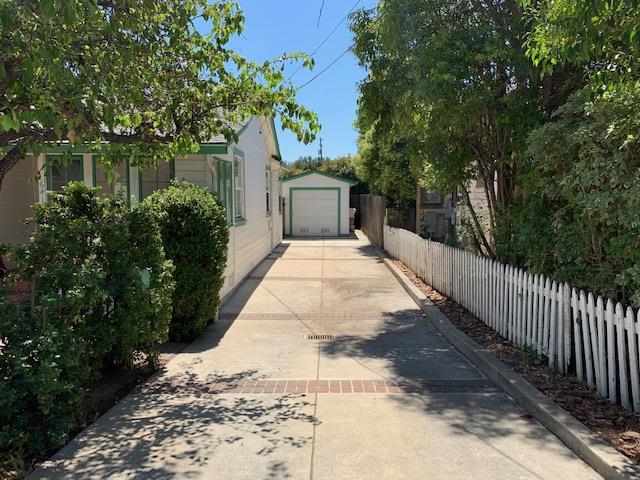 641 Waltermire Street Belmont, CA 94002 - Photo 3 of 7 a white house with trees in front of it