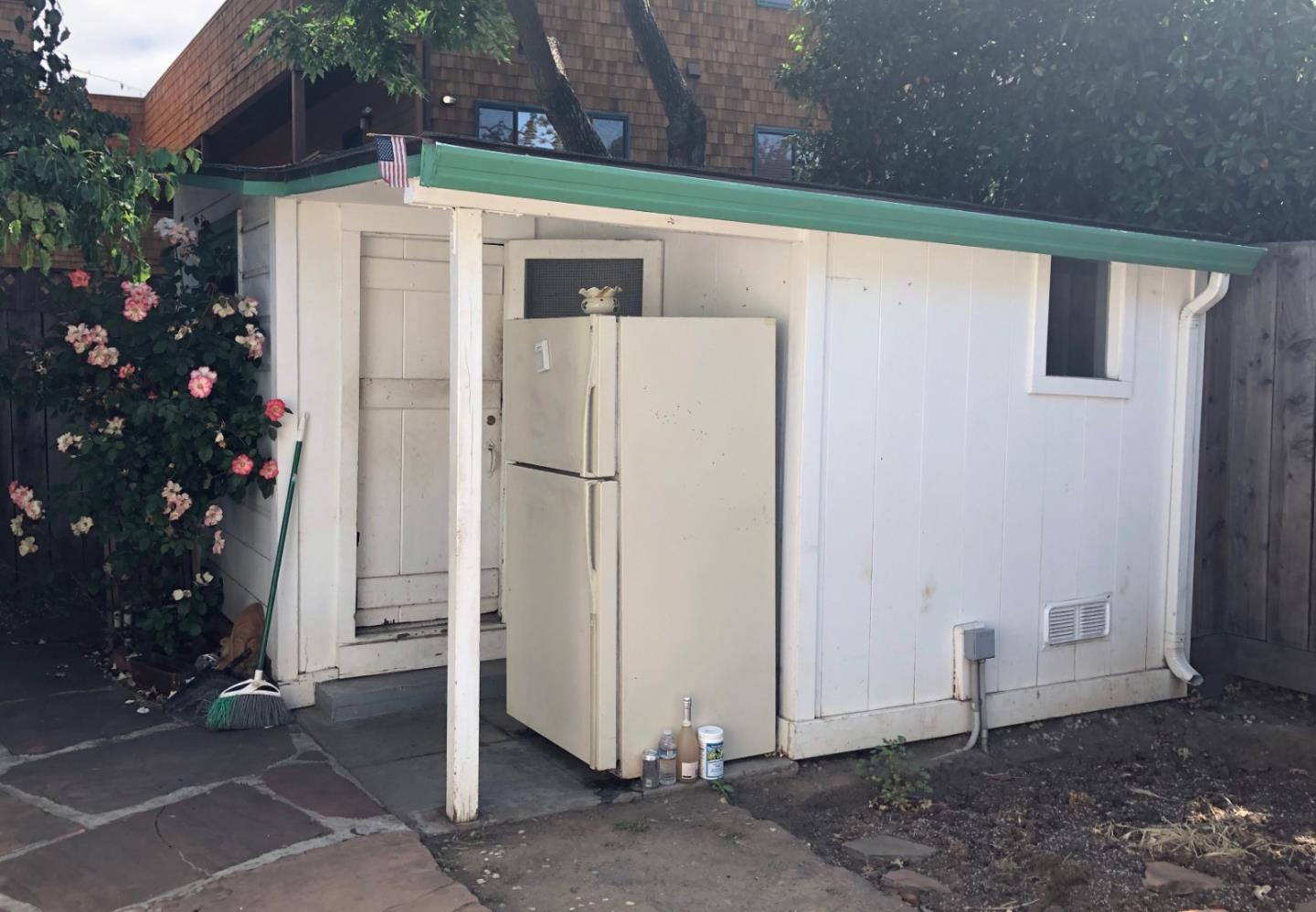 641 Waltermire Street Belmont, CA 94002 - Photo 5 of 7 a front view of a house with a yard