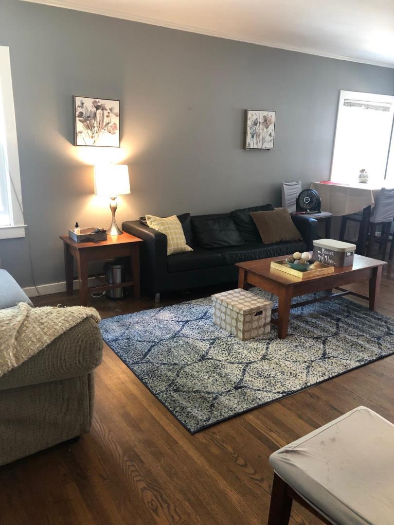 641 Waltermire Street Belmont, CA 94002 - Photo 7 of 7 a living room with furniture rug and window